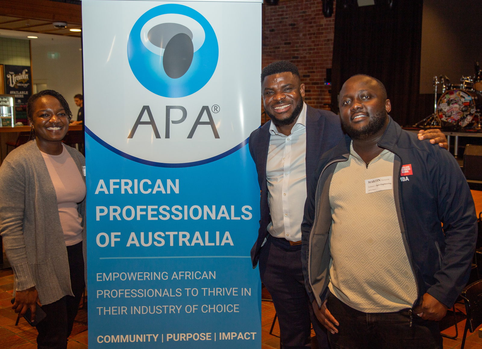APA members beside the association’s banner at a South Australia networking event